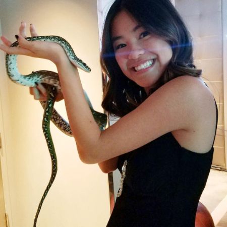 She is holding a snake 